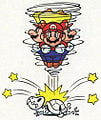 Caped Mario using a Spin Jump in Super Mario World.