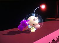 Olimar uses his f-tilt while holding a Pikmin.