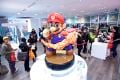 Large-scale model of Mario's amiibo at Nintendo New York in February 2016.