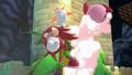 Knuckles attacking Kirby with an uppercut on The Great Cave Offensive.