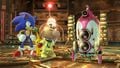 The Hocotate Bomb as it appears as an item in for Wii U. With Sonic, a Yellow Pikmin, and Olimar looking at it.