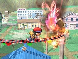 Ness hitting Lucas with PK Fire in Super Smash Bros. Brawl.