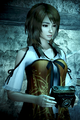 Yuri holding the Camera Obscura in Fatal Frame: Maiden of Black Water