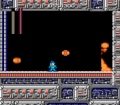 The Yellow Devil using its multiple body parts to attack Mega Man while moving to the other side of the boss room in Mega Man.