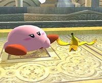 Kirby in his tripped position after stepping on a Banana Peel.
Source