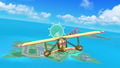 The yellow seaplane flying near the 2D island.