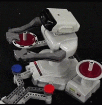 The original R.O.B. peripheral reaching for a Gyro. Screencapped from an AVGN video, actually.